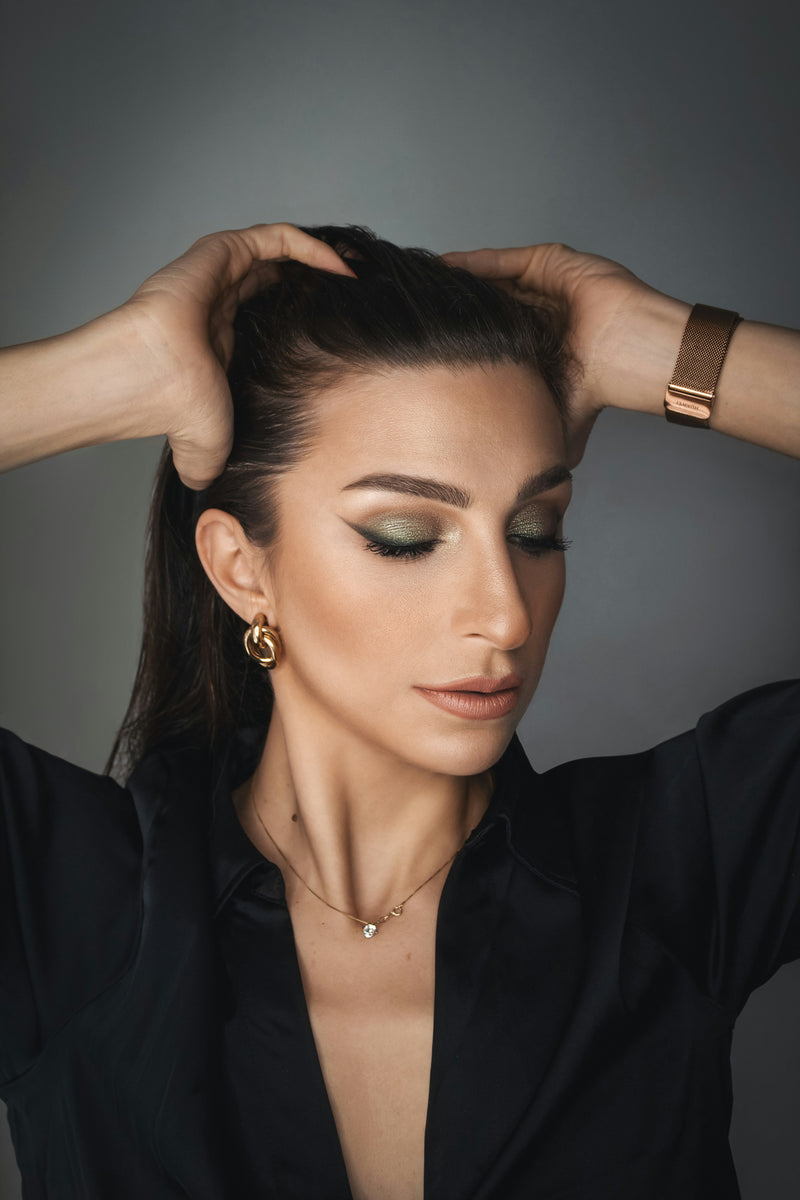 Veliora gallery - model with gold earrings